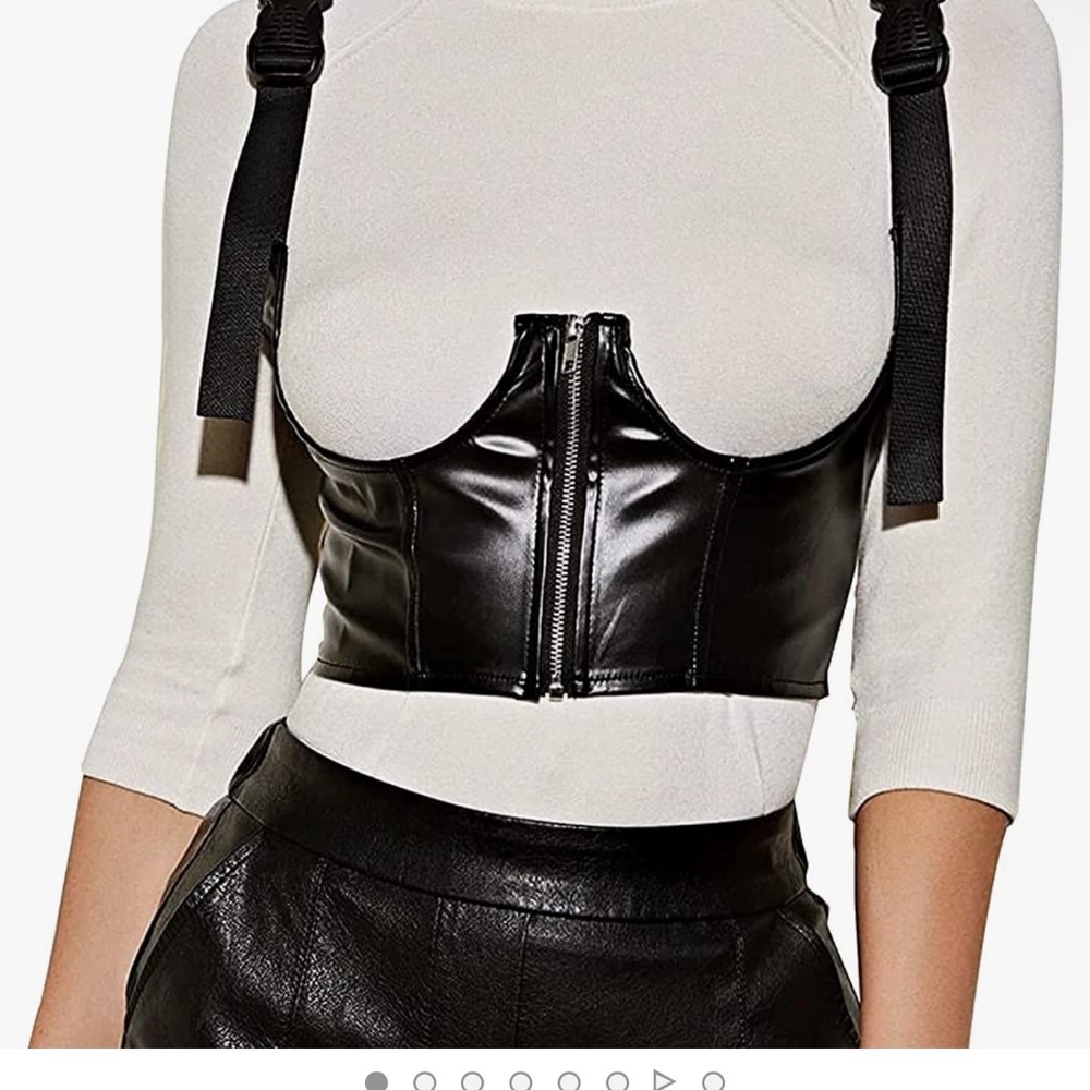 This is a black corset type top. Brand new never worn. Size small.